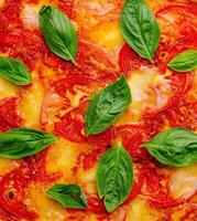 Pizza Margherita close up or macro background photo