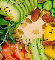 Hawaiian Poke Bowl with Salmon, Avocado and Cucumber photo