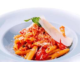 Italian style pasta with tomato sauce and parmesan photo