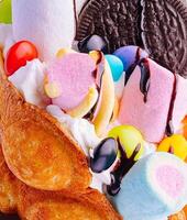 Hong kong or bubble waffle with ice cream and marshmallows photo