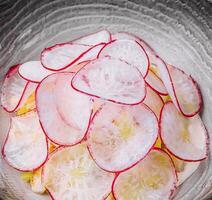 Summer cold soup - okroshka in a ceramic bowl photo