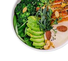 Healthy salad bowl with chicken breast top view photo