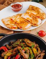 Mexican Food Fried Cecina and quesadilla photo