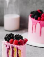 Fruit cake with fresh raspberry, blackberry and vanilla cream photo
