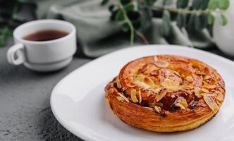 Delicious homemade bakery with almonds and raisins photo