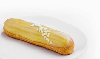 Delicious eclair with custard on plate top view photo