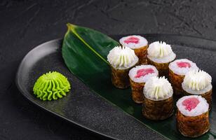 sushi maki rolls with tuna inside with Philadelphia cheese photo