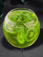 alcoholic cocktails with kiwi close up photo