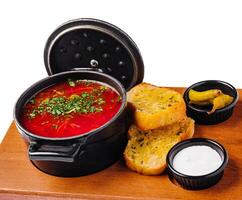 Ukrainian borscht red soup with garlic bread photo