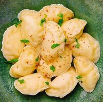 dumplings with cottage cheese close up top view photo