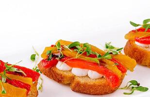 bruschetta with mozzarella and bell pepper photo