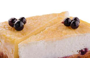 Black currant cheesecake with berries close up photo