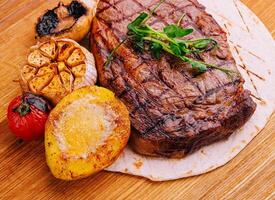 Grilled Tenderloin steak with vegetables photo