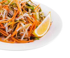 Fresh coleslaw salad in white plate photo