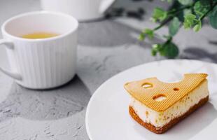 sponge cake and cup of tea photo