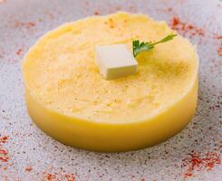 Mashed Potatoes with Butter on plate photo