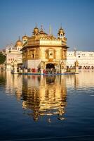 Beautiful view of Golden Temple - Harmandir Sahib in Amritsar, Punjab, India, Famous indian sikh landmark, Golden Temple, the main sanctuary of Sikhs in Amritsar, India photo