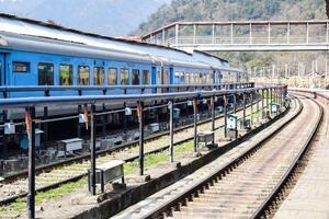 Kathgodam, Uttarakhand, India, September 25 2023 - Indian railway train at Kathgodam railway station platform during morning time, Colourful train at Kathgodam, Uttarakhand railway station photo