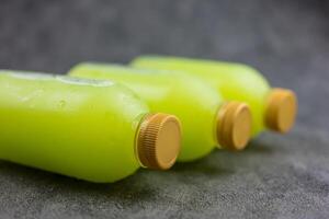 Guava juice bottles with golden lid three bottles photo