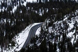 Single Car On Mountain Road From Afar photo