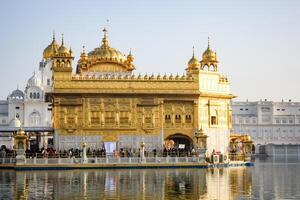 Beautiful view of Golden Temple - Harmandir Sahib in Amritsar, Punjab, India, Famous indian sikh landmark, Golden Temple, the main sanctuary of Sikhs in Amritsar, India photo