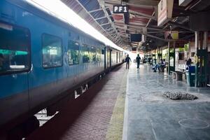 Kathgodam, Uttarakhand, India, September 25 2023 - Indian railway train at Kathgodam railway station platform during morning time, Colourful train at Kathgodam, Uttarakhand railway station photo