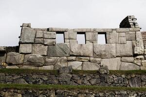 Stone Wall Three Windows Machu Picchu Peru South America photo