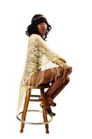 Skinny African American Woman Sitting Gold Shawl photo