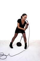 Young Mixed Black Woman Singing Microphone Stand photo