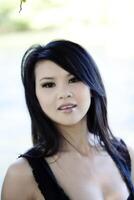 Outdoor Portrait Attractive Young Asian American Woman photo