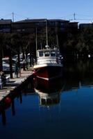 Depoe Bay, OR, 2016 - Red And White Fishing Boat Tied To Dock photo