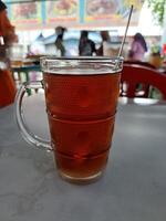 warm tea in a large glass cup photo