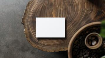 AI generated Blank white business card mockup on wooden plate, chop board. Grey table backgound. Modern minimalist template. Branding identity. Natural Flat lay, top view photo