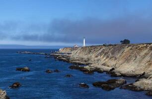 Point Arena California Lighthouse With Cliffs And Ocean photo