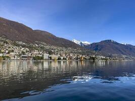 a view of the lake and mountains in the background photo