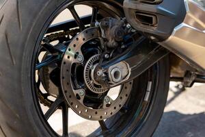 rear wheel of a motorcycle with a brake photo
