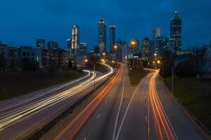 Atlanta skyline with blurred motion traffic lights on the highway or interstate photo