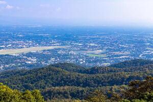 Panoramic view of city and tropical jungle Chiang Mai Thailand. photo