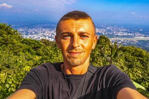Panorama view of city with man tourist Chiang Mai Thailand. photo