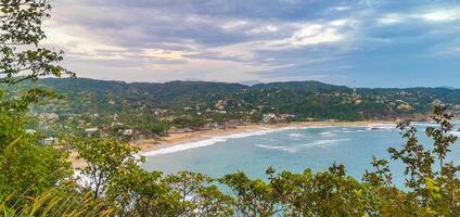 Punta Cometa Playa Mazunte sunset beach panorama view Mazunte Mexico. photo