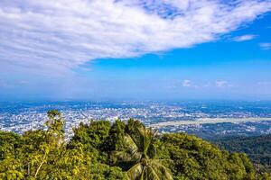 Panoramic view of city and tropical jungle Chiang Mai Thailand. photo