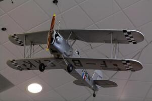 Denver, CO, 2011 - Bi-Plane Display At Airport Hanging From Ceiling photo