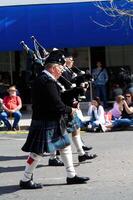 Marysville, CA, 2011 - Men Playing Bagpipes In Kilts For Parade photo