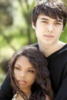 Outdoor portrait young teen caucasian male hispanic female photo