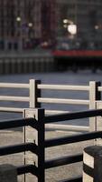 A row of benches sitting next to a body of water video