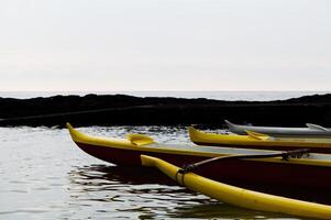 Kona, Hawaii, 2011 - Bow Of Three Hawaiian Canoes In Water Big Island Hawaii photo