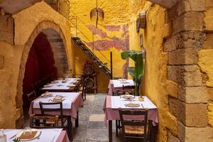 Greece, Chania Island restaurants and cafes. Traditional Greek food in historic center photo