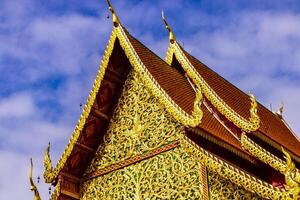 Golden Wat Phra That Doi Suthep temple building Chiang Mai Thailand. photo