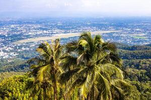 Panoramic view of city and tropical jungle Chiang Mai Thailand. photo