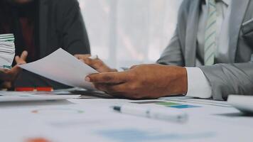 Finance manager meeting discussing company growth project success financial statistics, professional investor working start up project for strategy plan with document, laptop and digital tablet. video